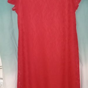Melon (orange/red) colored dress. Midi length size 2X. Lace covered with liner.